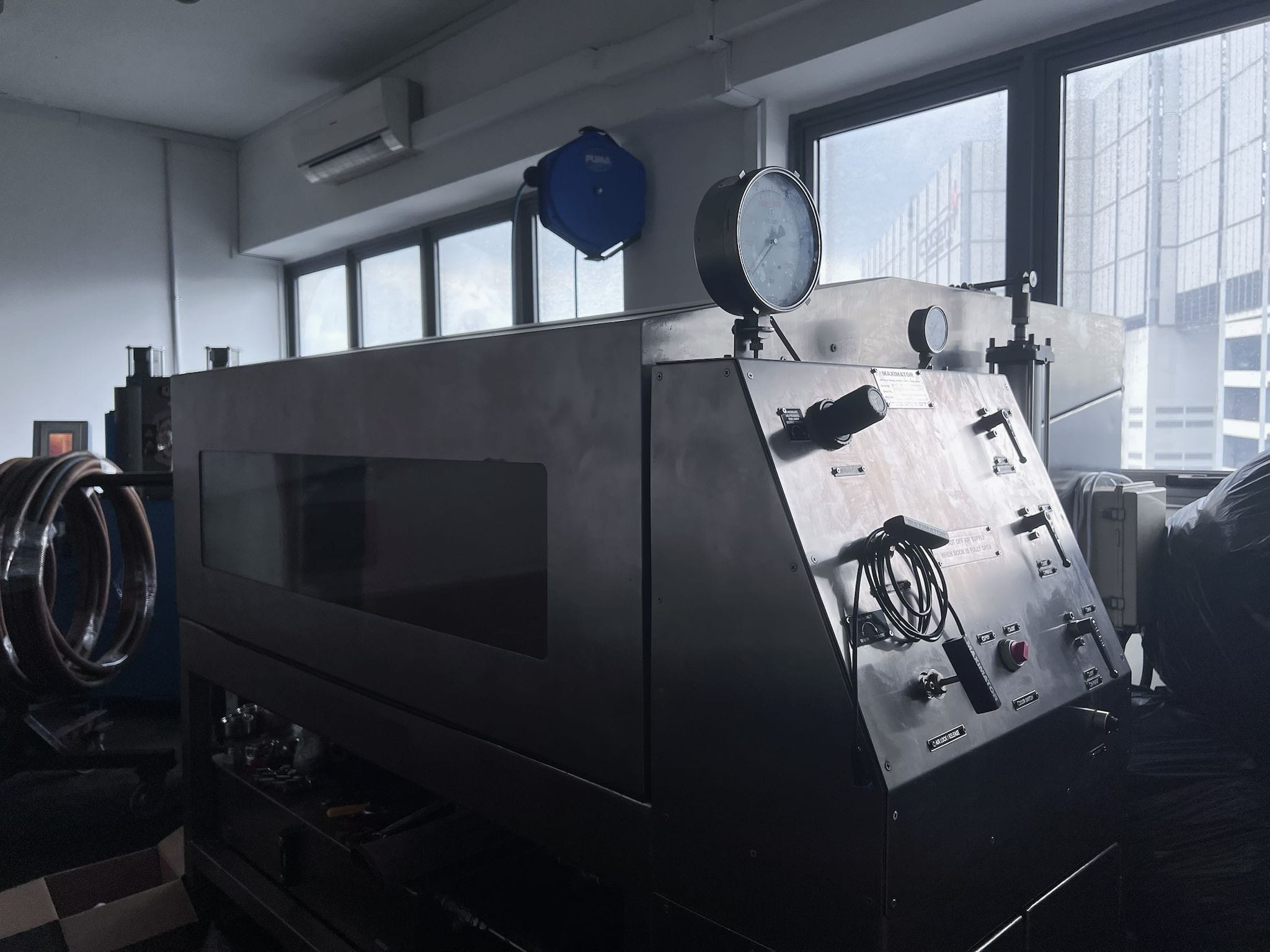Close-up of diagnostic equipment during testing procedures at SG Dynamics Pte Ltd.​